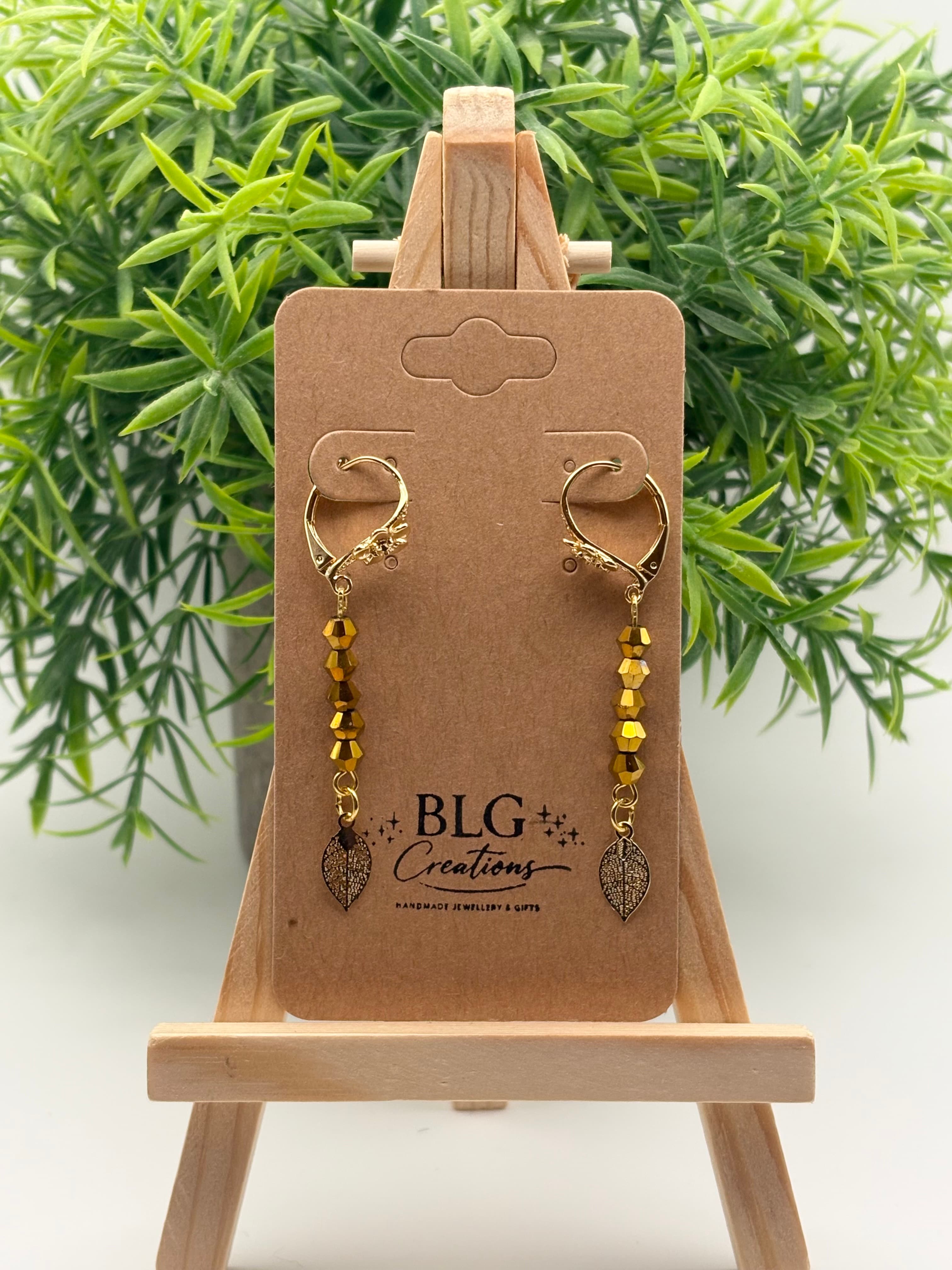 Yellow Gold Flower Hoop Earrings with Leaf Detail